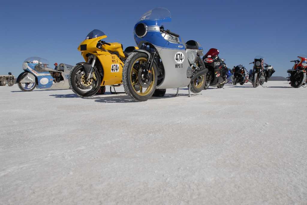 Bikes lined up on the salt flat