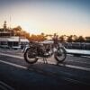 1973 Triumph Bonneville T140V on wharf at sunset