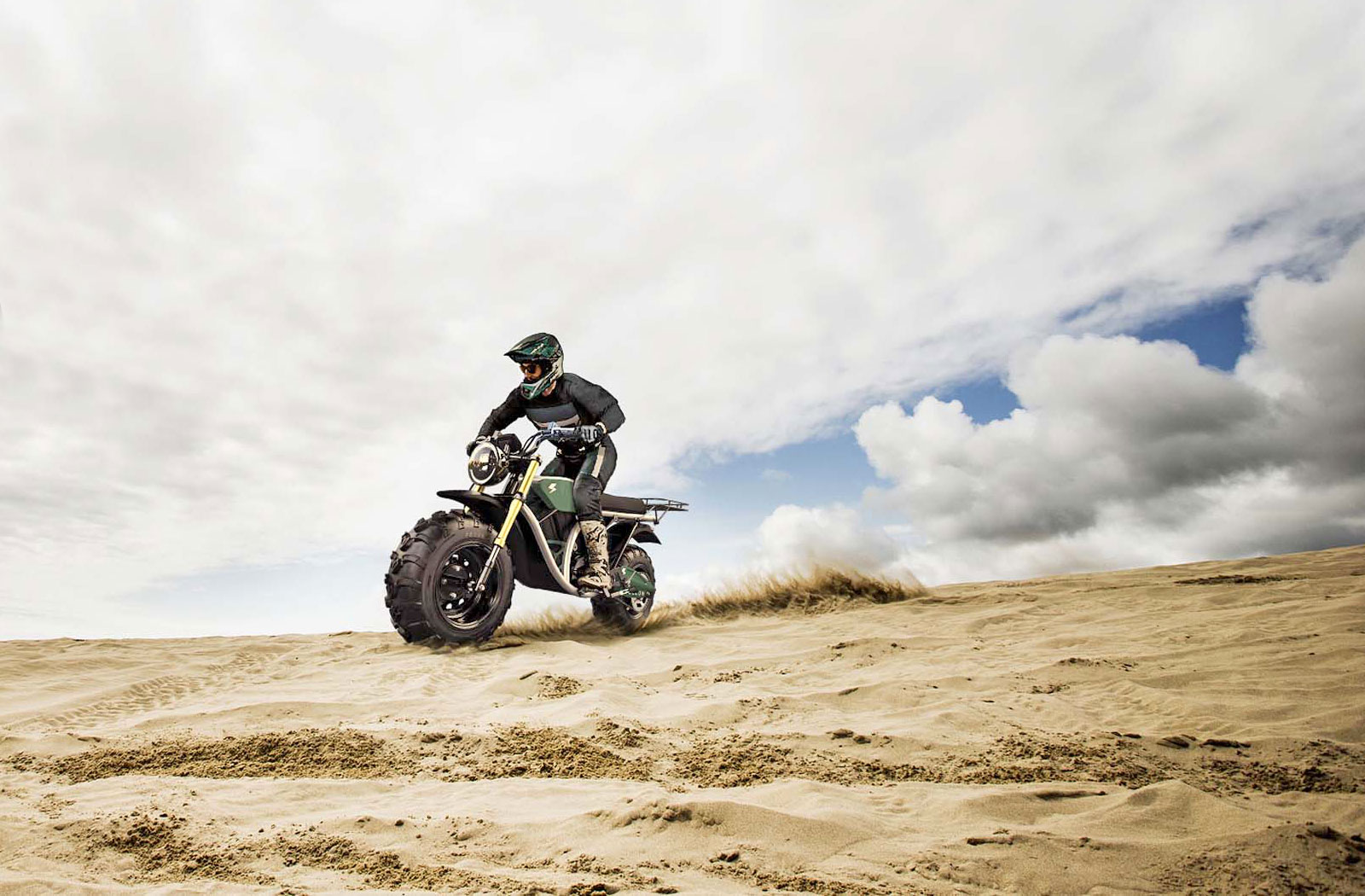 Volcon Grunt blasting across a sandy beach