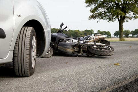 Motorbike Accident on the road with a car