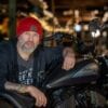 Ola Stenegard, Design Director for Indian Motorcycles leans on a new Chief model
