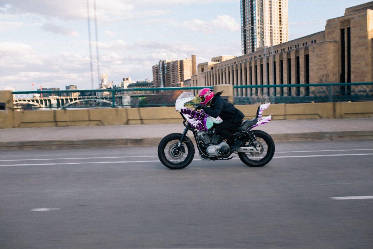 David Change from Cafe Racers of Instagram riding a bosozoku Harley motorcycle in Minneapolis on a freeway