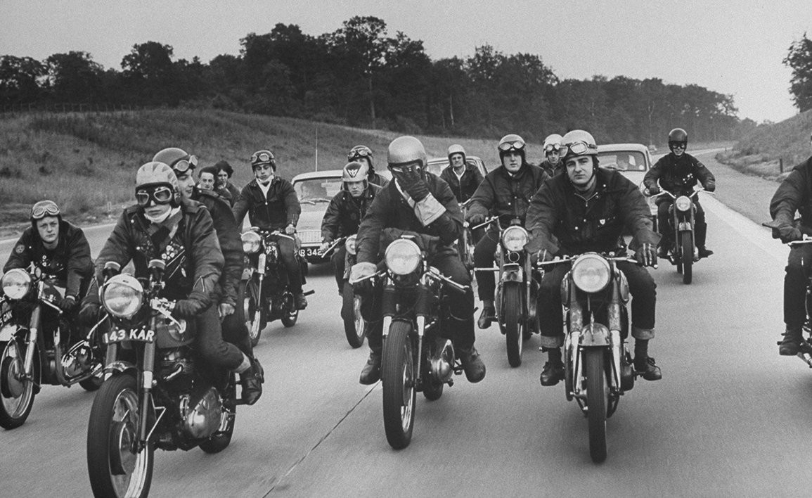 A group of original cafe racers ride along a British Motorway circa 1960