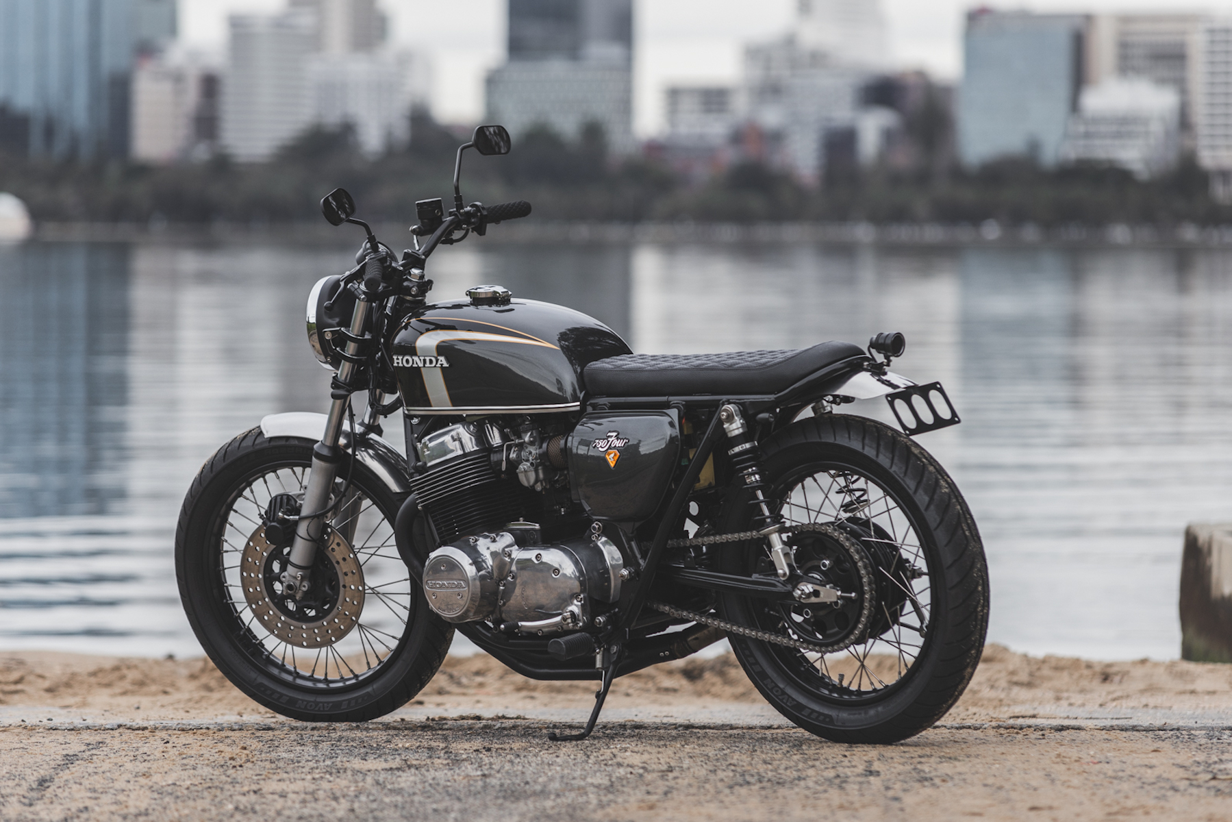 A left-side view of a Honda CB750 on a dock