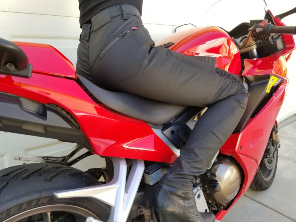 Rider on a Honda motorcycle wearing Kusari KEV 02 jeans