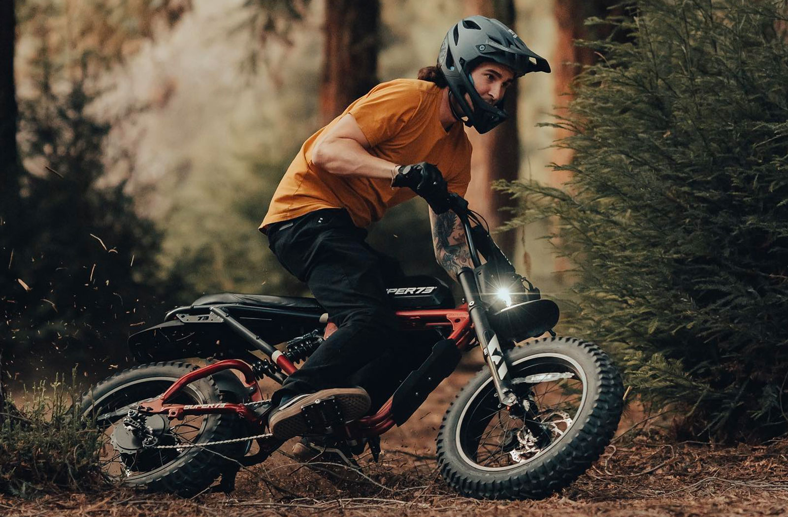 Cyclist riding Super73 eBike in forest