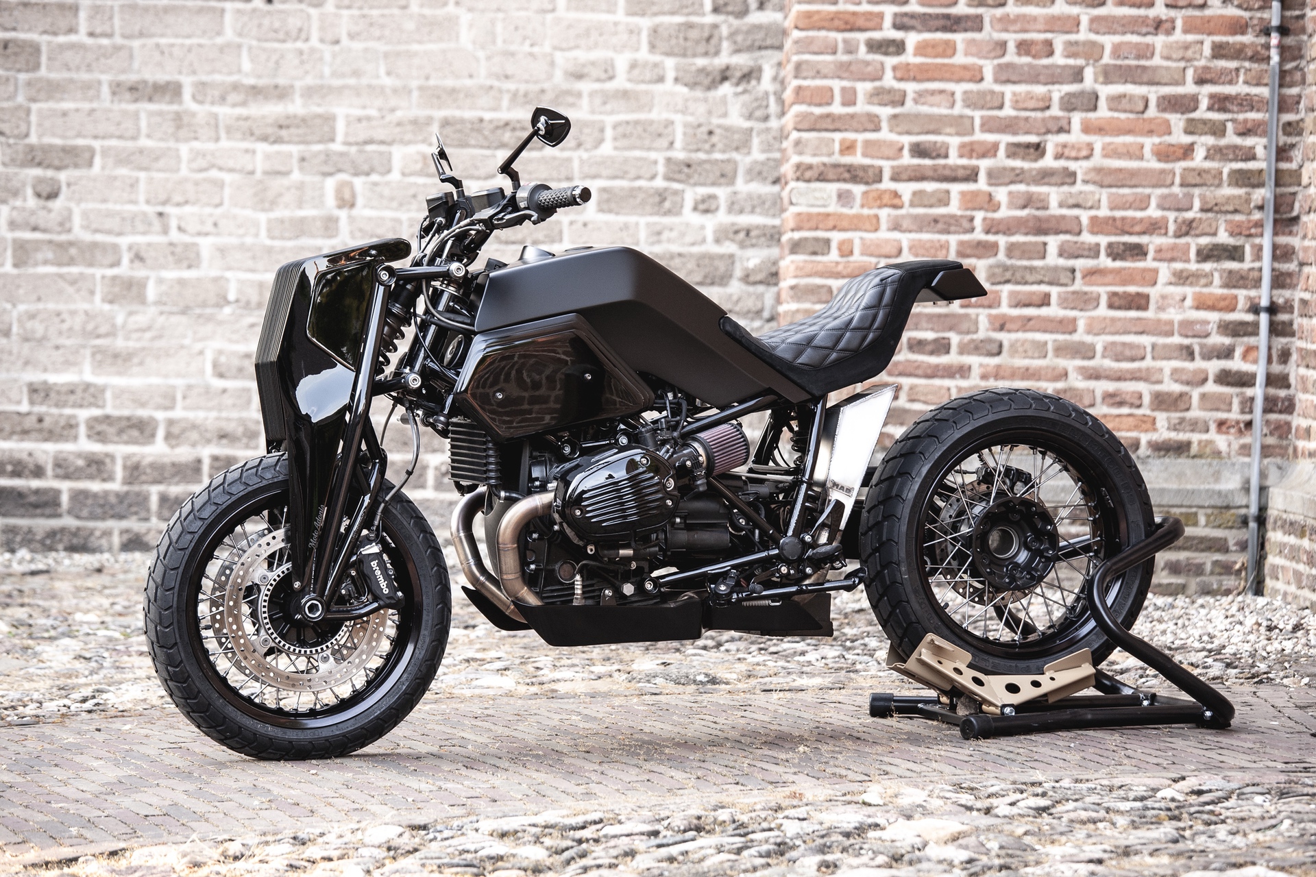 Moto Adonis BMW R nineT Girder custom motorcycle in Amsterdam alley