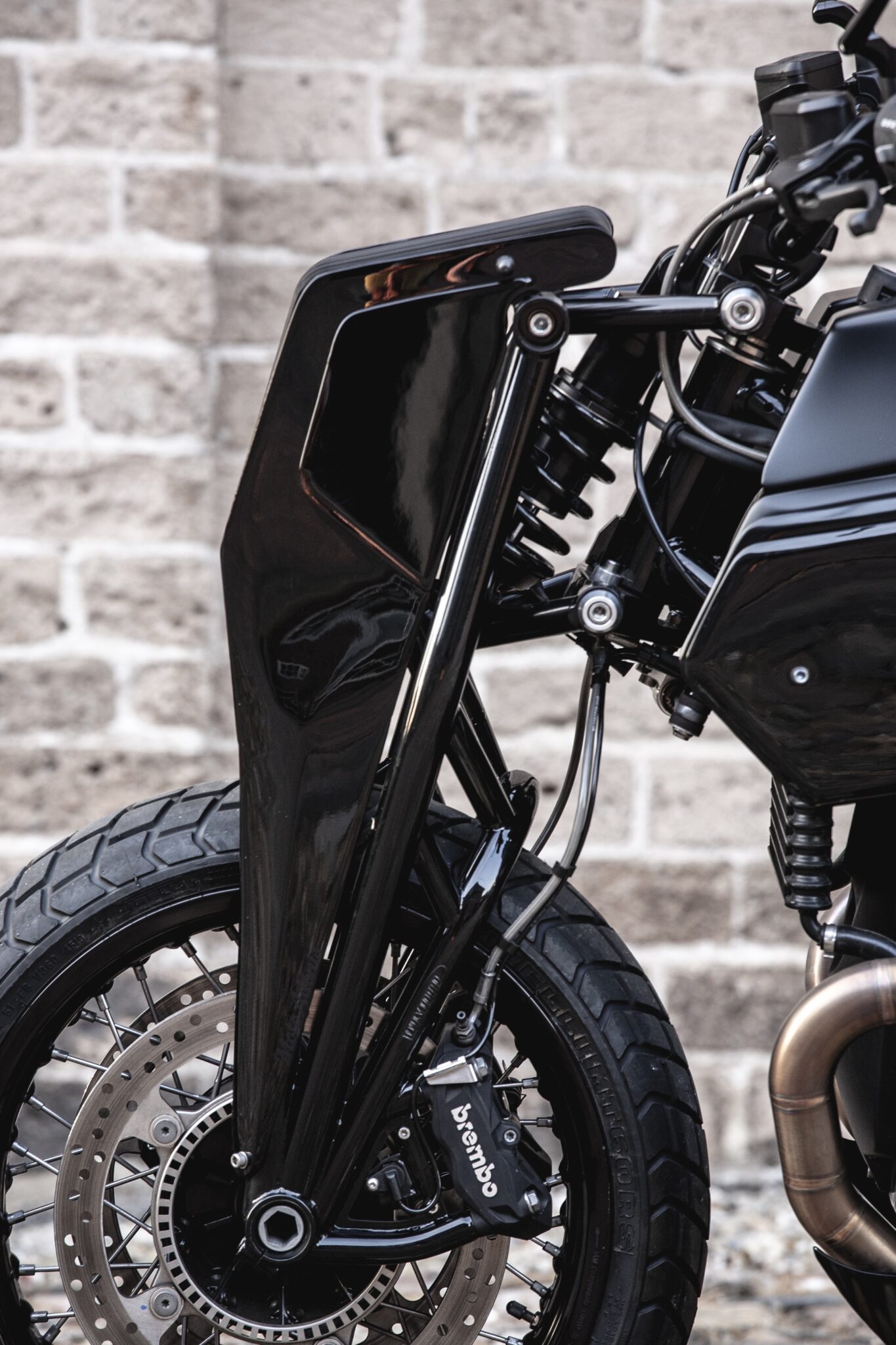 Close up of front forks on Moto Adonis BMW R nineT Girder custom motorcycle