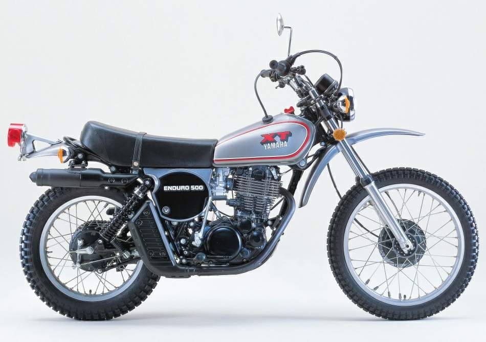 Original 1970s factory photo of Yamaha XT500 motorcycle on grey background