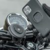 Hand installing phone on the Quadlock motorcycle phone mount