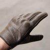 Top of left hand of man wearing Thumpa Summer Glove by Black Pup Moto