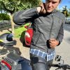 Author doing up Neowise Jacket by Andromeda Moto before riding