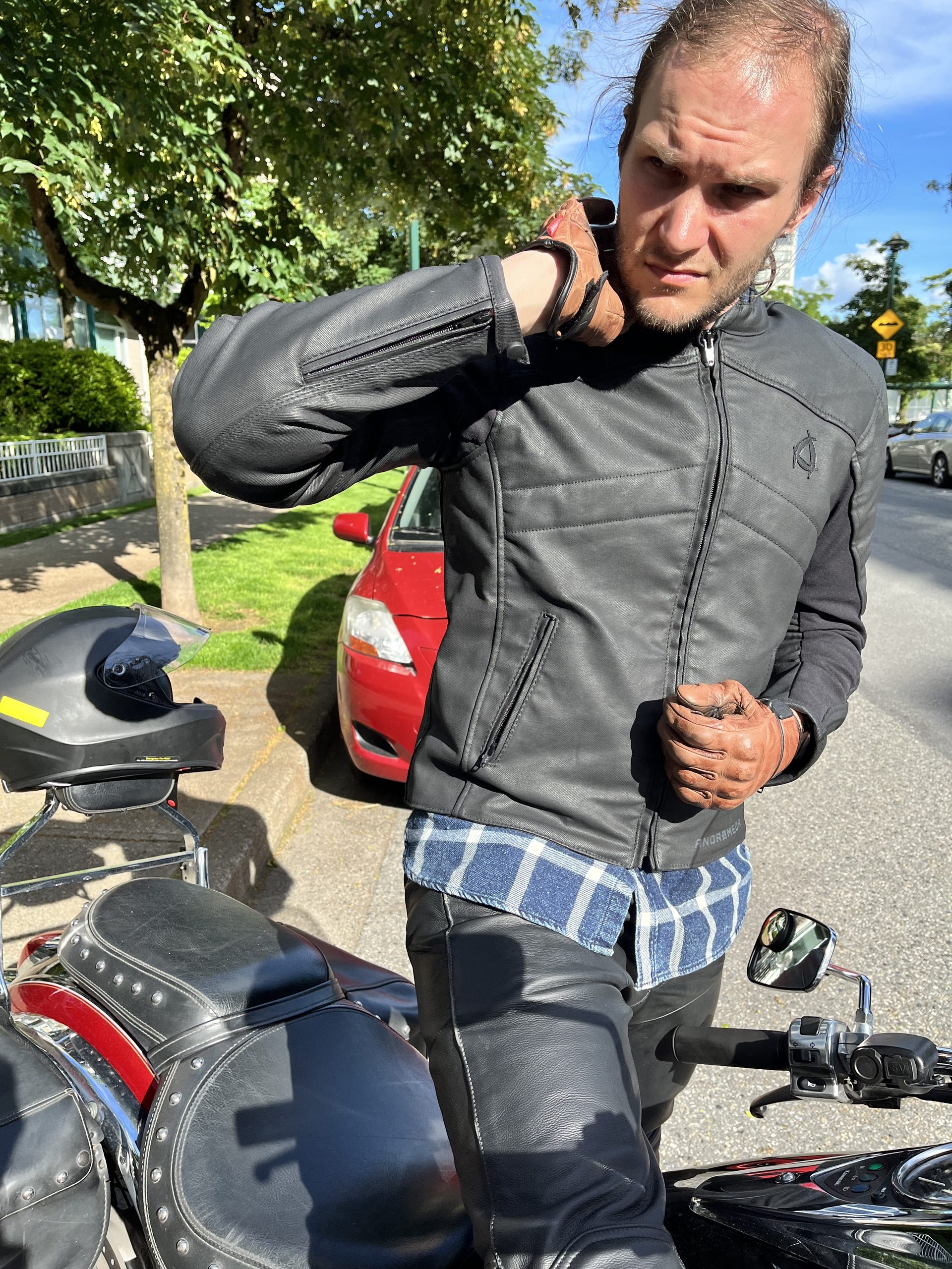 Author doing up Neowise Jacket by Andromeda Moto before riding