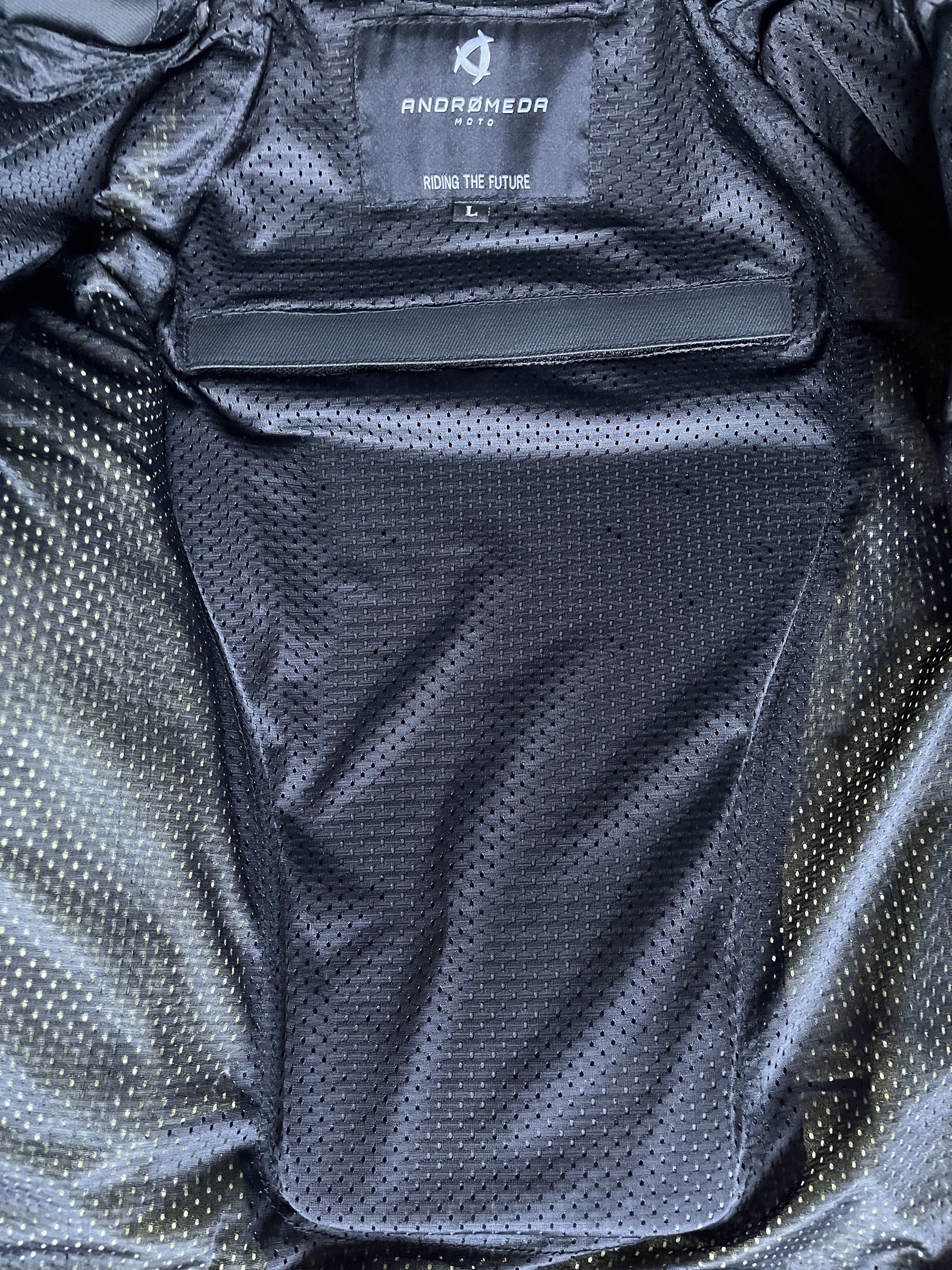 Close-up of back pad in Neowise Jacket by Andromeda Moto