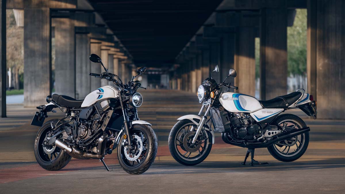 A 2020 Yamaha XSR700 motorcycle alongside a classic, early ‘80s RD350LC