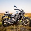 A 2020 Yamaha XSR700 motorcycle stands alson on a hill in Sydney's rural outer suburbs