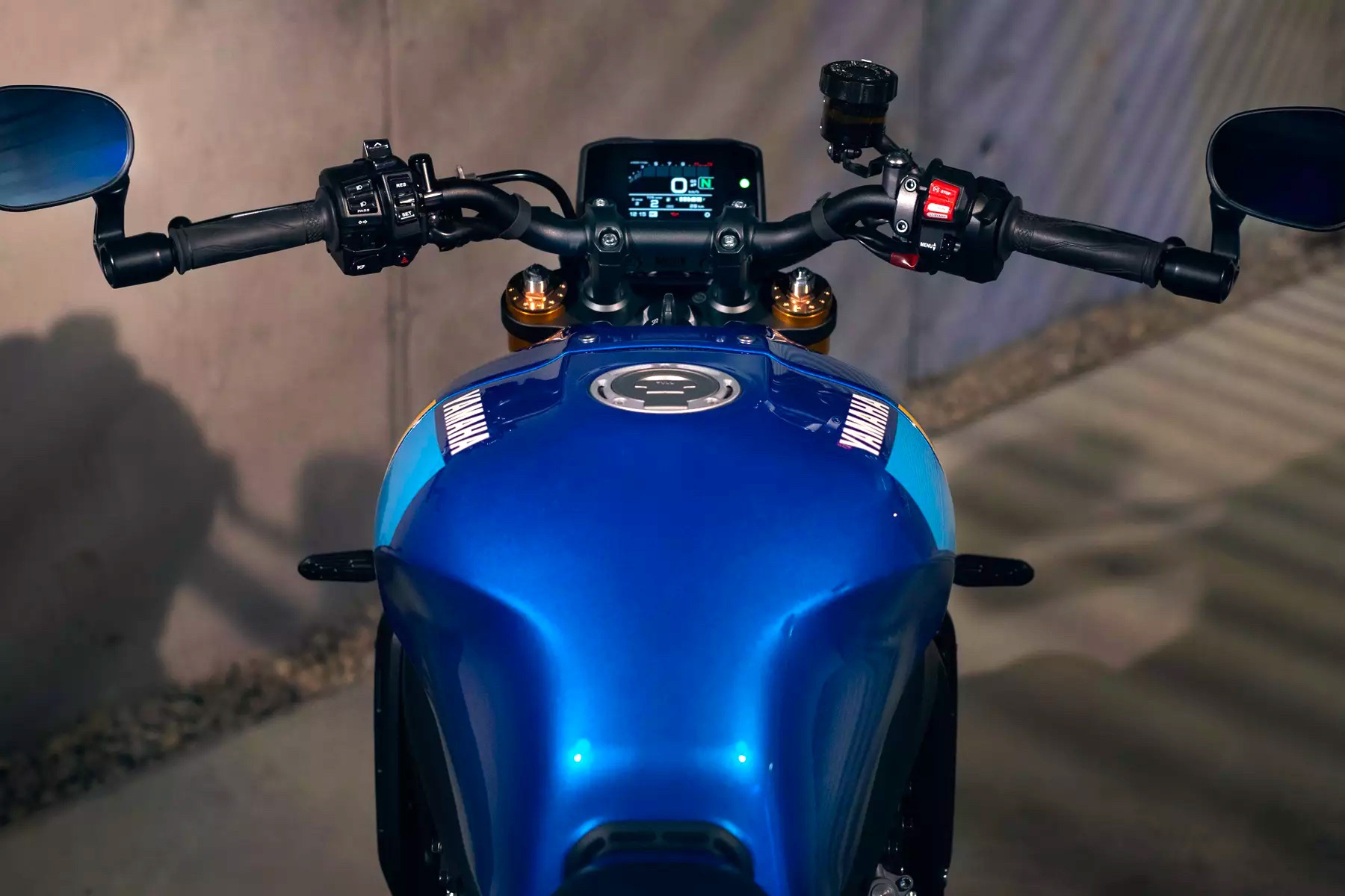 The 2022 Yamaha XSR900 motorcycle with dash detail and tank