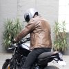 Man on motorcycle wearing Black Pup Moto Nelson Leather Jacket