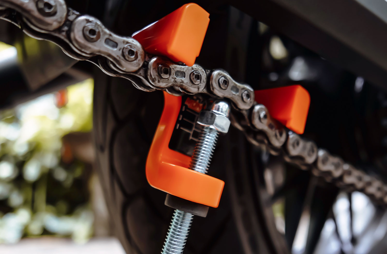 DIY motorcycle chain tension adjustment tool