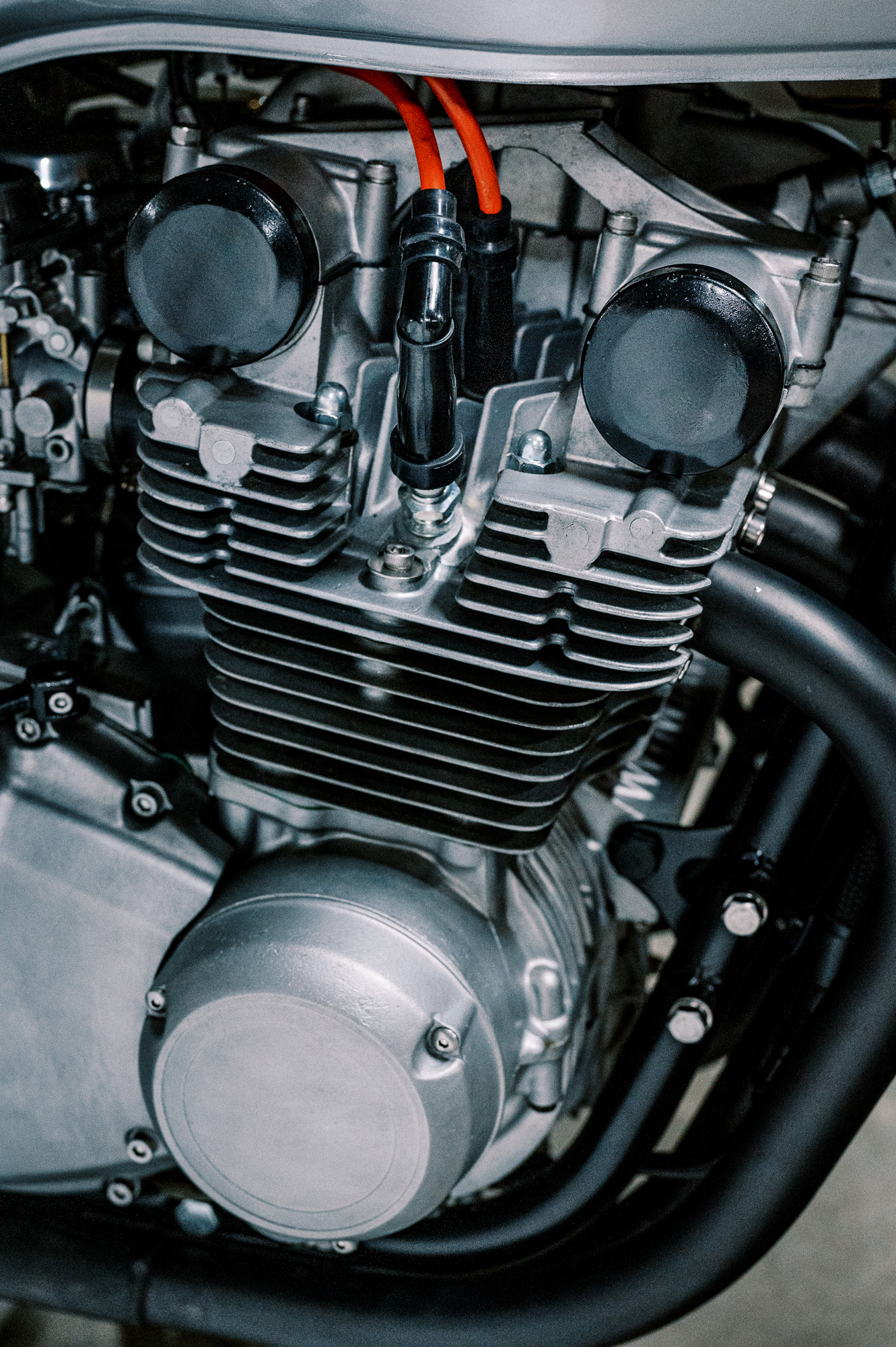 The engine of a 1981 Suzuki Katana Motorcycle in an underground carpark