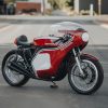 Landscape photo of a Honda CR750 motorcycle parked in the street